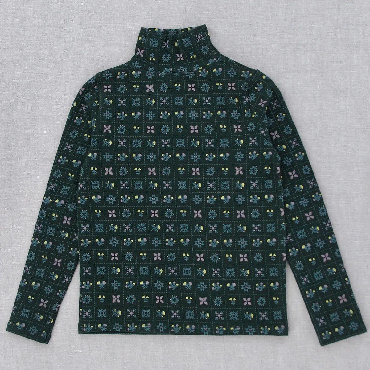 Snap Turtleneck in Black Forest Folk Quilt by Iver & Isla