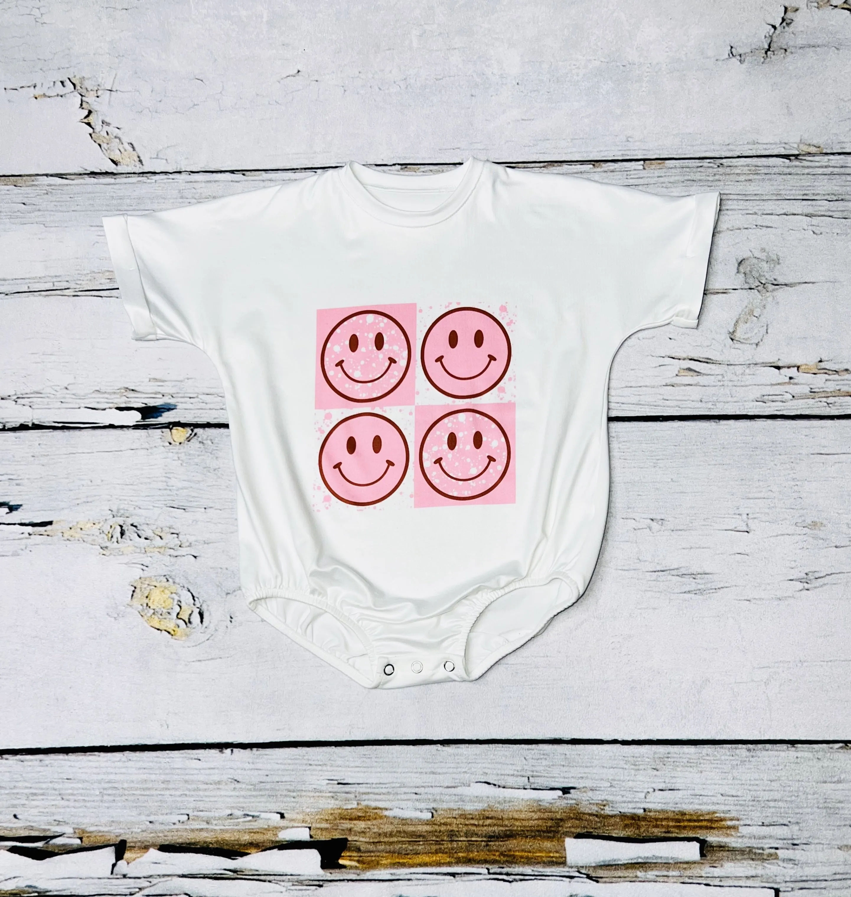White w/light pink smiley faces baby bubble romper DLH1215-24